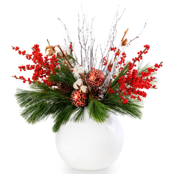 White glass vase with Christmas floral arrangement