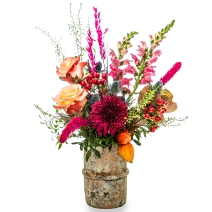 Automn floral arrangement in pink and burgundy colors