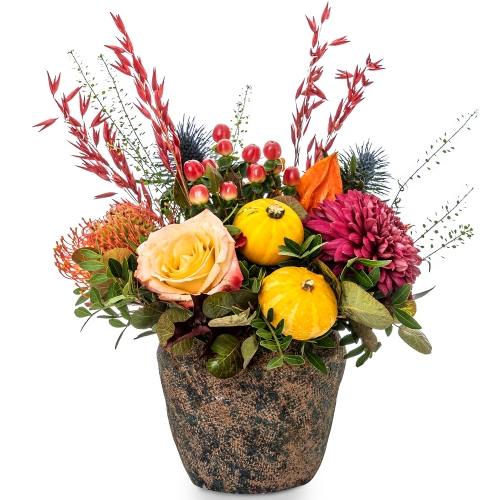 Round autumn flower arrangement in small size stone vase