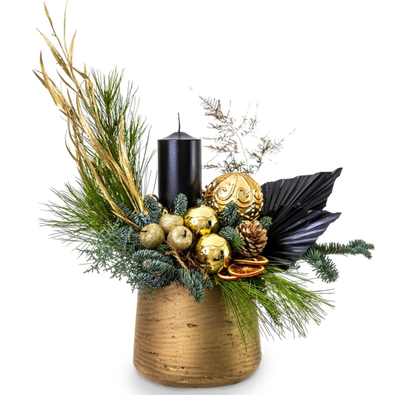 Christmas arrangement in golden shades and black candle