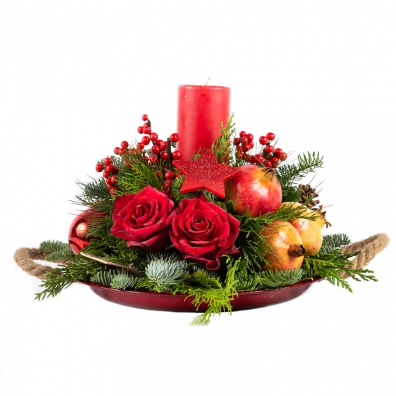 Red Christmas arrangement on a plate