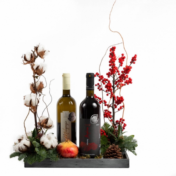 Christmas arrangement with two wines