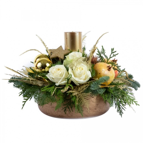 Gold christmas arrangement with candle