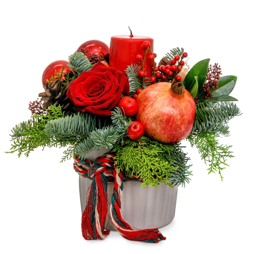 Christmas arrangements in a clay vase