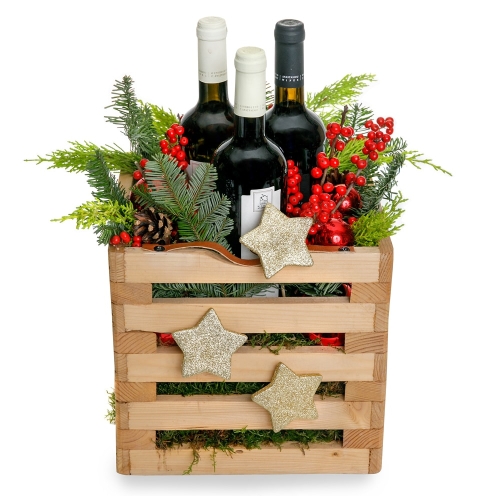 Christmas composition with three wines in a wooden pot