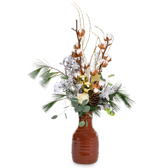 White christmas arrangement with pine, ornaments and roses