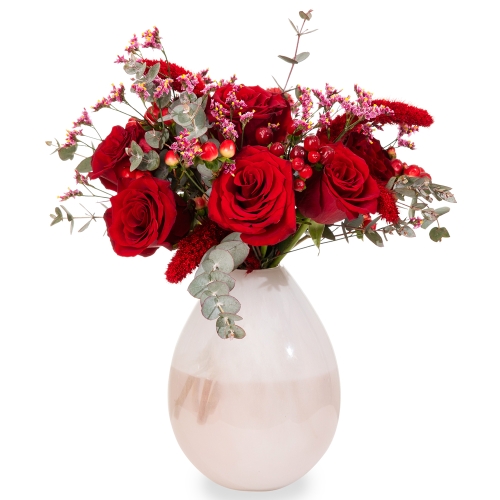 White vase with red roses 