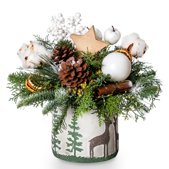 Christmas table arrangement with foliage and accessories