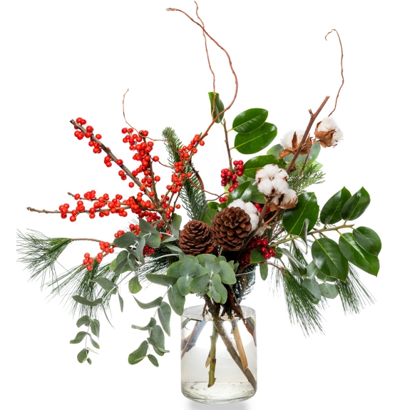 Christmas foliage, ilex and cotton in a glass vase